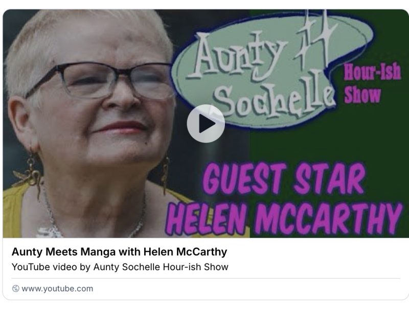 Opening screen of The Aunty Sochelle Podcast features the podcast logo at top right, the text GUEST STAR: HELEN MCCARTHY in purple caps at bottom right, and a Megaera Amis portrait photo of Helen on the left, all on a black background. Helen has cropped blonde hair and wears glasses. Today her earrings are a pair of wings serpents in dark gold and you can just see the silver chain of her Tyrannosaurus skeleton necklace.